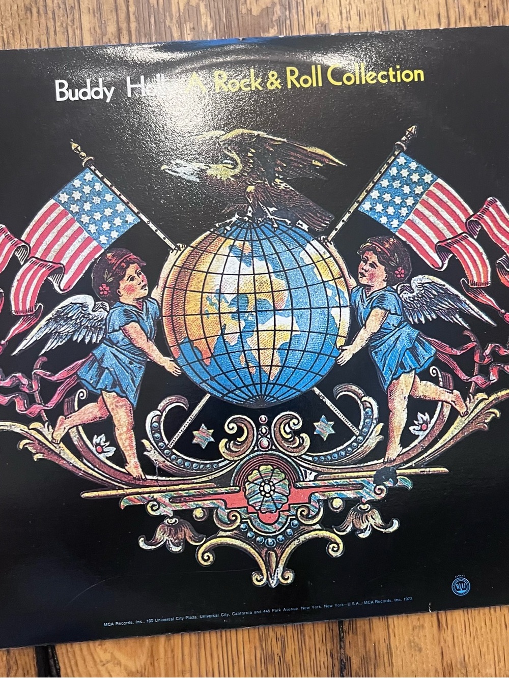 Buddy Holly Rock & Roll Collection Album Cover - Patriotic Globe Artwork
